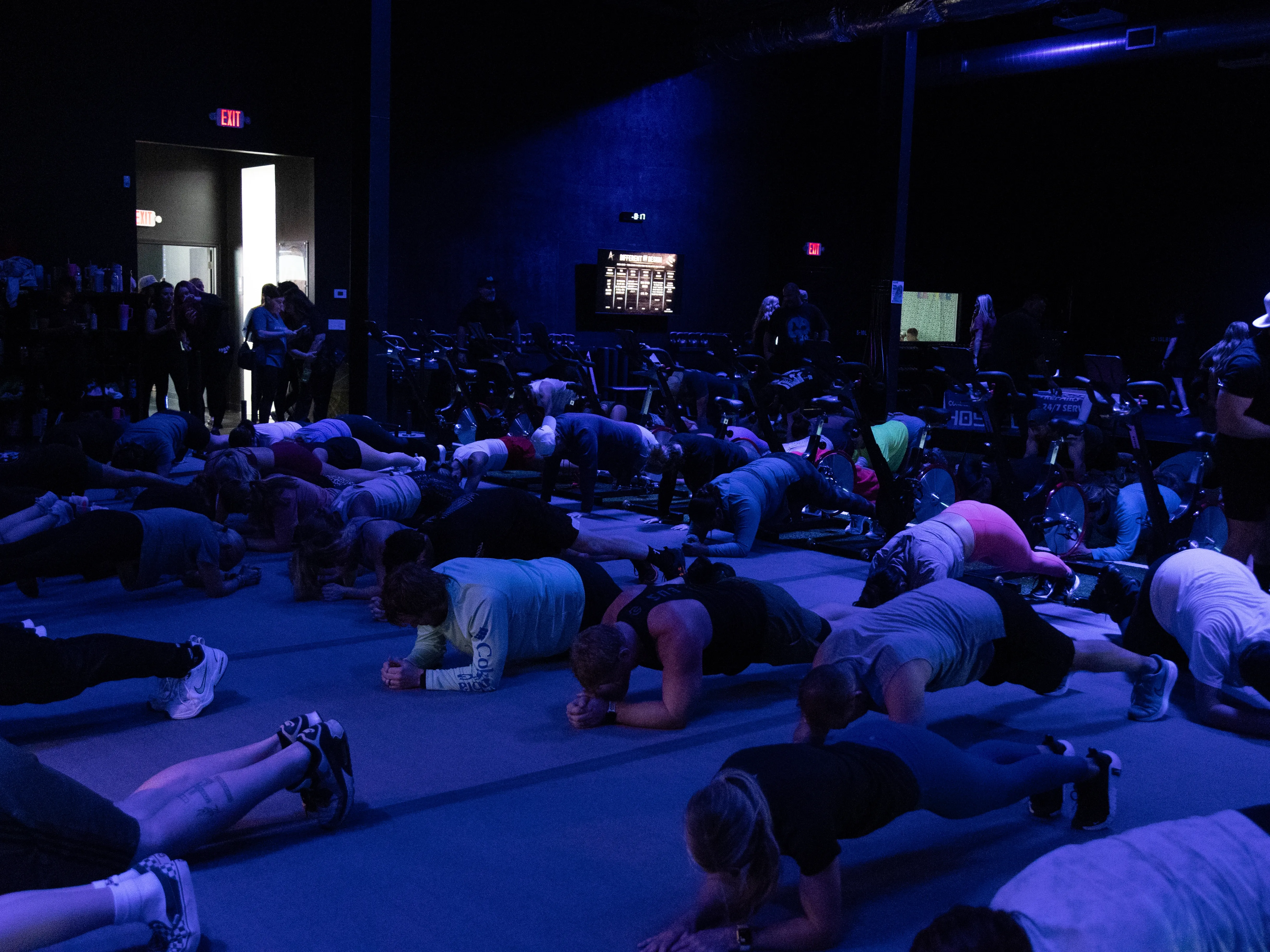 Coach guiding clients through a conditioning interval at The Forge in Norman, OK